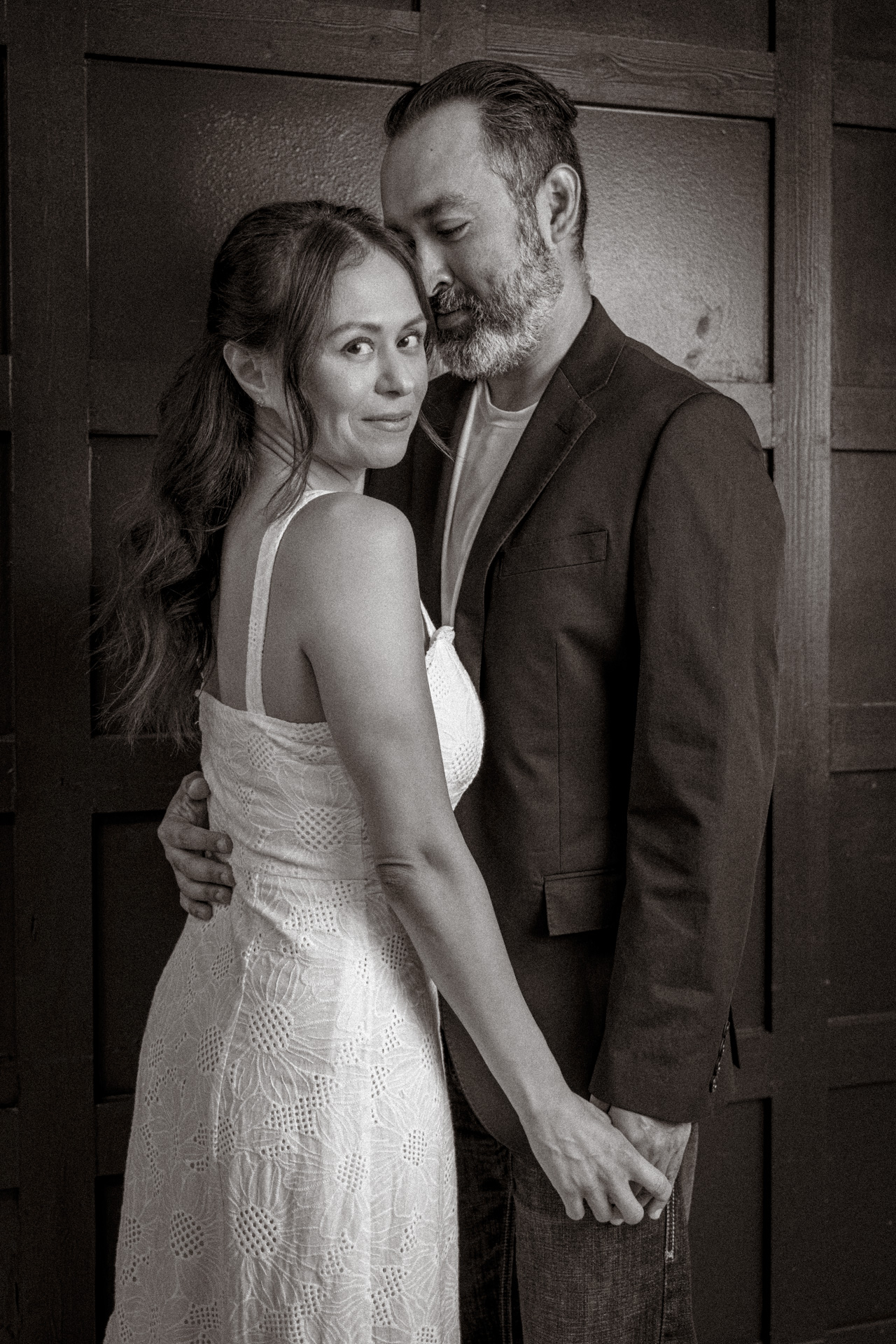black and white photo of couple posing